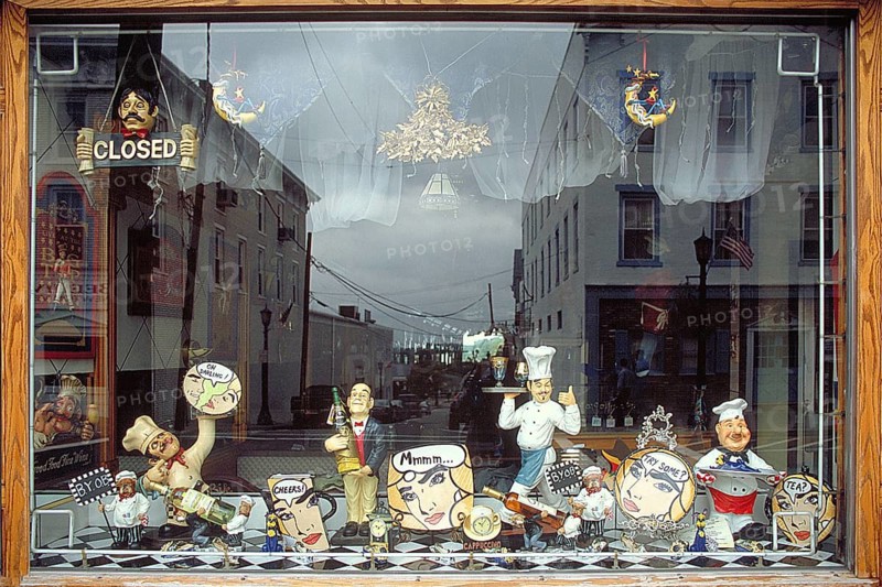Shop window with cooking figures of all kinds, New York City, USA
