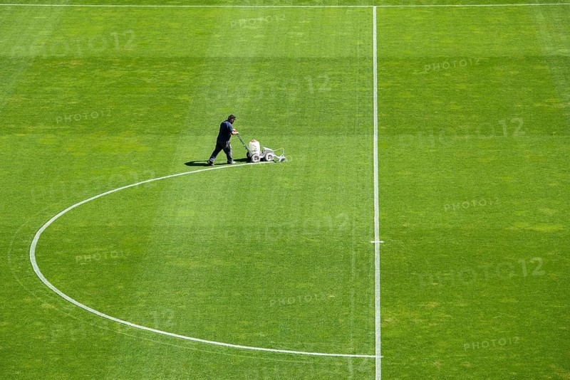 Painting line on a soccer pitch