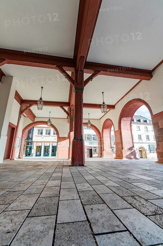 Historic arcades with stone columns and lighting in an inner courtyard, Weil der Stadt, Böblingen district, Germany