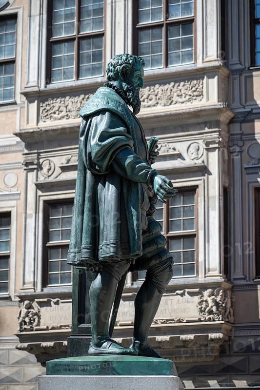 Bronze statue of Hans Jakob Fugger (1516-1575) on Fuggerplatz in front of the Maximilian Museum, Old Town of Augsburg, Swabia, Bavaria, Germany