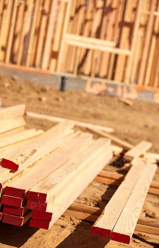 Stack of Building Lumber at Construction Site with Narrow Depth of Field