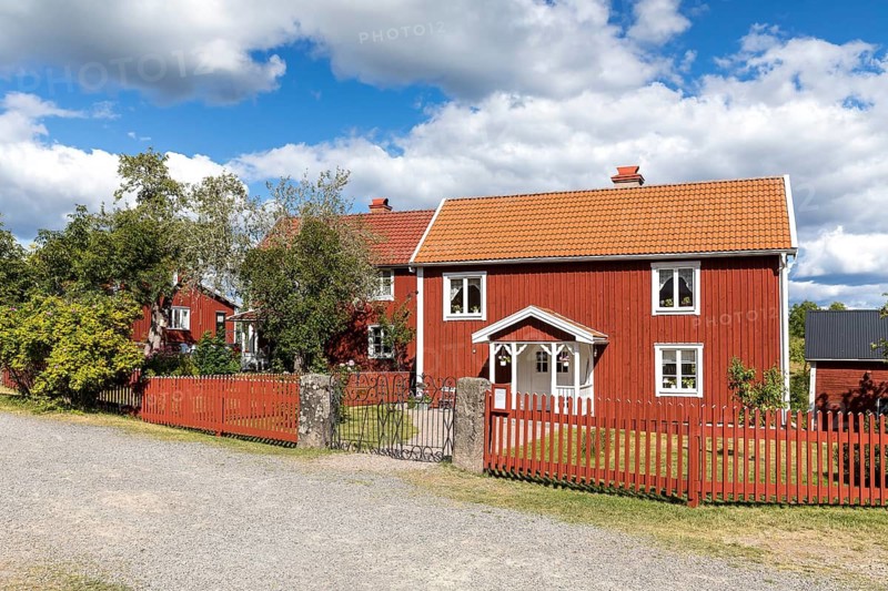 3 typical Swedish red houses, these houses in Sevedstorp are the basis for a children's book by Astrid Lindgren, The Children of Bullerbü, Vimmerby, Kalmar län, Sweden