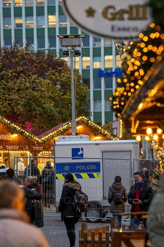Video surveillance by the police at the Porschekanzel, in front of the Marktkirche in the city centre of Essen, during the Christmas market, mobile surveillance system, crime focus, drug scene, street crime, the images are transmitted in real time to the police control centre, temporary attempt to make the city safer and deter criminals, North Rhine-Westphalia, Germany