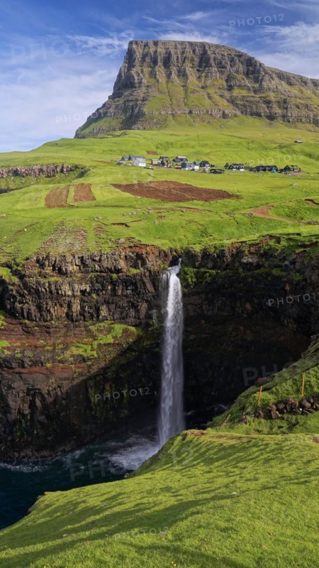 Mulafossur, waterfall and village view, Faroe Islands, Faroe Islands, Denmark