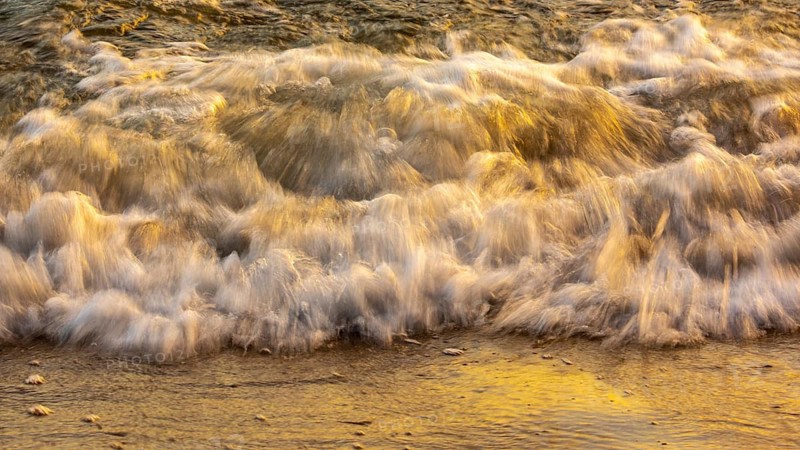 Wave play at sunrise on the chalk coast in Jasmund National Park, Rügen, Sassnitz, Mecklenburg-Western Pomerania, Germany