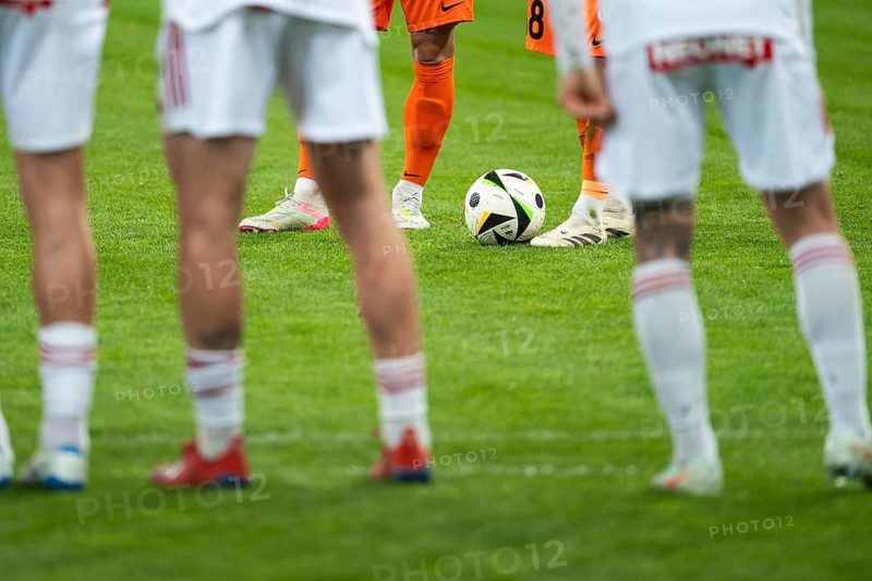 LUBIN, POLAND - MARCH 31, 2025: Football match between KGHM Zaglebie Lubin vs Rakow Czestochowa. Players legs during free kick