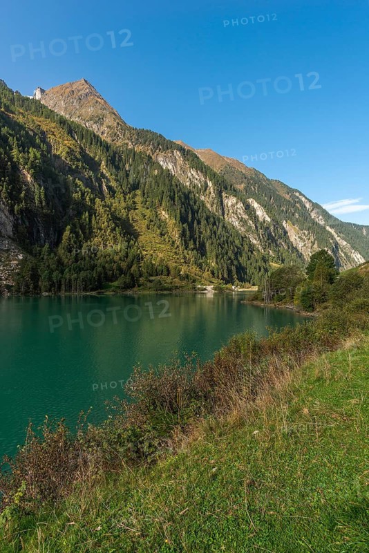 Stilluptal, Stiillup reservoir (1116m), Stillupgrund, Mayrhofen, reservoir lake, alpine mountain landscape, coniferous forest, blue sky, Zillertal Alps, Tyrol, Austria