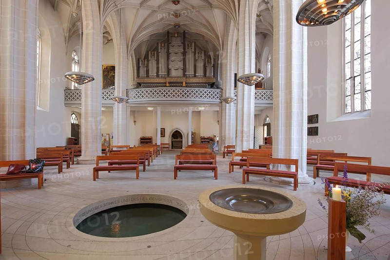 Interior view with baptismal font and chancel, late Gothic St. Petri Pauli church - baptismal church of Martin Luther, Luther city Eisleben, Harz, Saxony-Anhalt, Germany