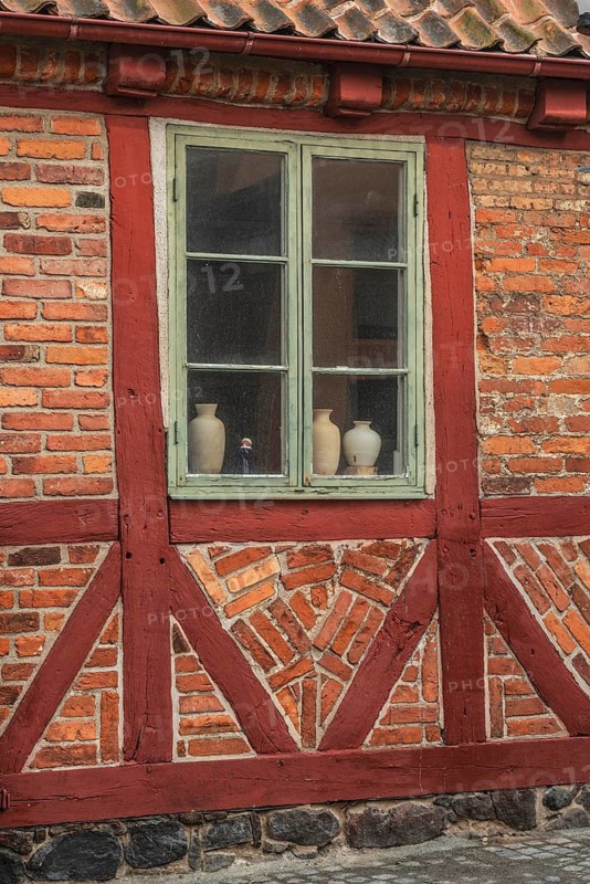 Window in old half-timbered house in Ystad's historic city center, Skåne County, Sweden, Scandinavia