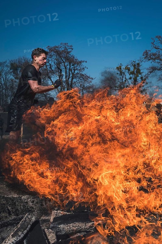 WROCLAW, POLAND - APRIL 7, 2018: Extreme running with obstacle RUNMAGEDDON. In the picture a runner on the Recruit route