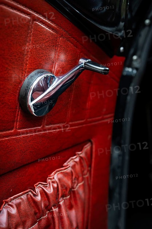 Front door with window crank and red leather trim, vintage car, Volvo Amazon, medium class car from Swedish car manufacturer Volvo, built in 1968