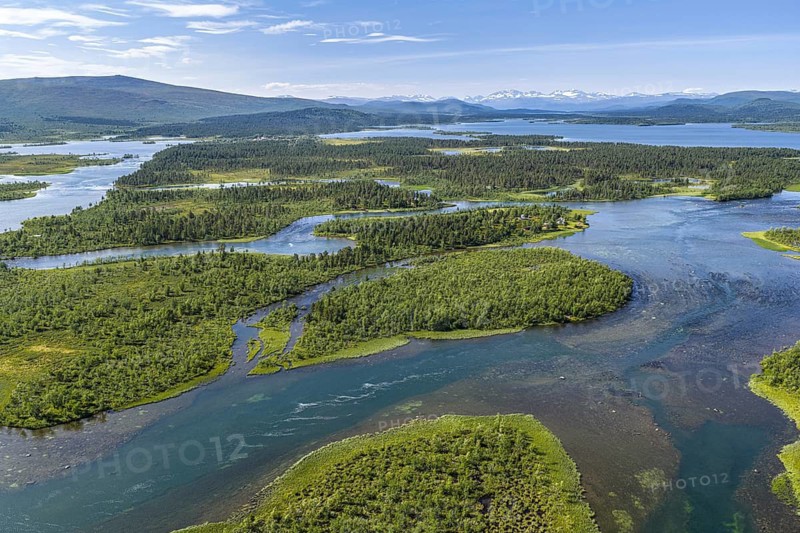 Road along lakes and green forest, road Kiruna to Nikkaluokta, aerial view, Sweden