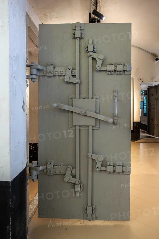 Locking mechanism on gas-tight steel armoured door inside Fort van Liezele, fortress of the National Redoubt, province Antwerp, Belgium