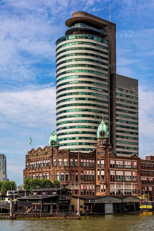 Hotel New York, historic art nouveau building on the Kop van Zuid, former headquarters of the Holland America Line, thousands of emigrants once left this place for North America, modern architecture in the city panorama, Rotterdam, Netherlands