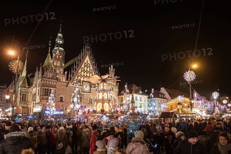 WROCLAW, POLAND - DECEMBER 09, 2018: Christmas fair in the market square of Wroclaw a part on front of city hall