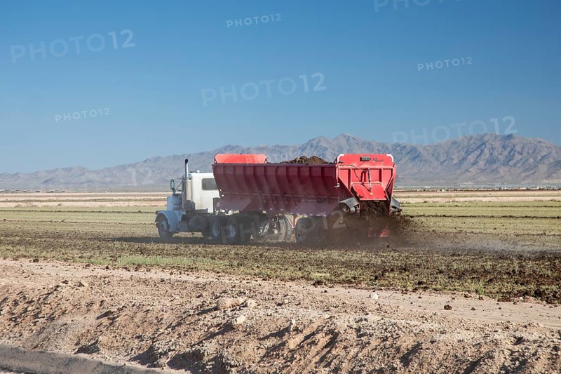 Buckeye, Arizona - Fresh soil is spread on a farm in the Arizona desert