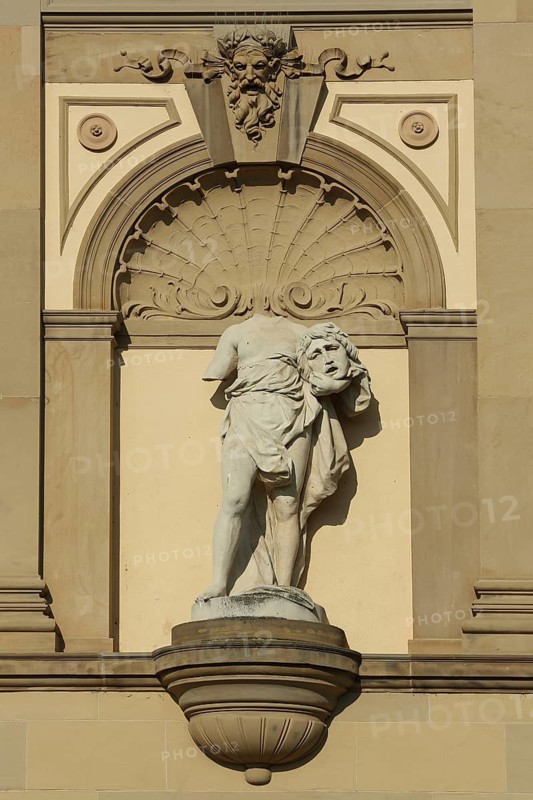 Headless statue with head under arm at the Staatstheater, without, missing, symbol, beheaded, stone sculpture, modern art, Wiesbaden, Taunus, Hesse, Germany