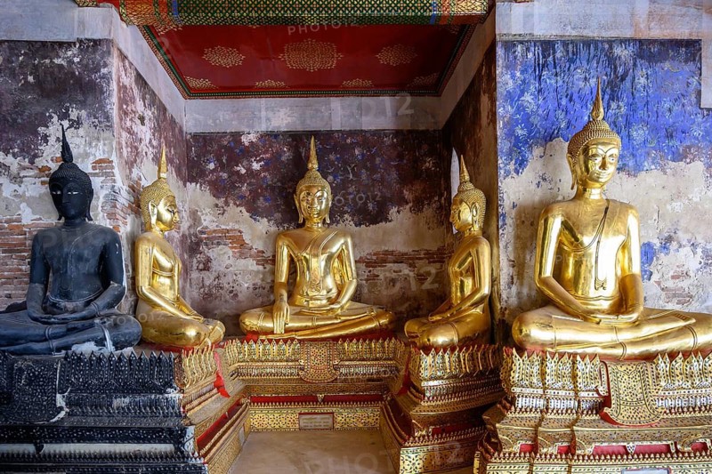 Bangkok, Thailand. February 20th 2025. Iconic black and golden Buddha statues on display in the The Wat Suthat Thepwararam Temple