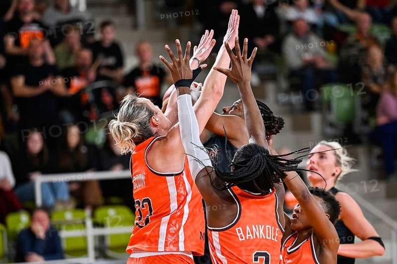 POLKOWICE, POLAND - FEBRUARY 22, 2023: Baskteball match EuroLeague Women between BC Polkowice vs Bourges Basket. Players struggle under the basket.