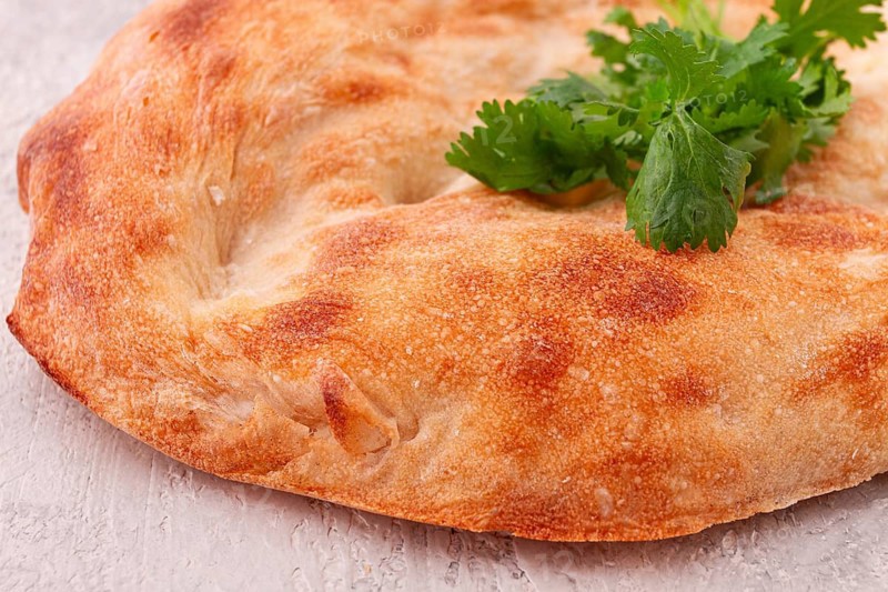 Georgian lavash bread, freshly baked, top view, on the table, no people