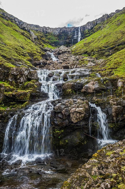 Waterfall tumbling down the hill, Streymoy, Faroe islands, Denmark