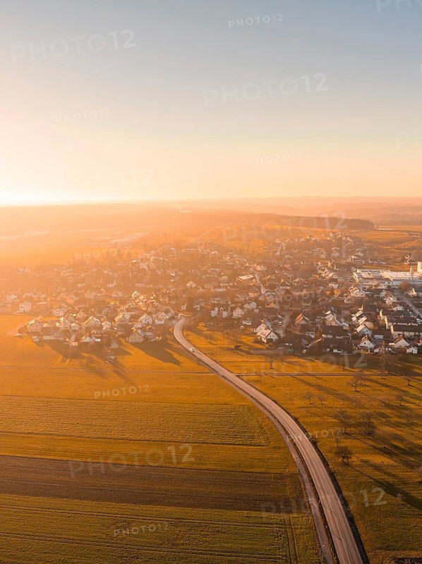 Aerial view of a village with fields at sunset, warm colours, Obergaugstett, district of Calw, Black Forest, Germany