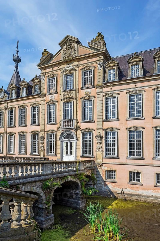1750 moated Poeke Castle, Kasteel van Poeke in Rococo style near Aalter, East Flanders, Belgium