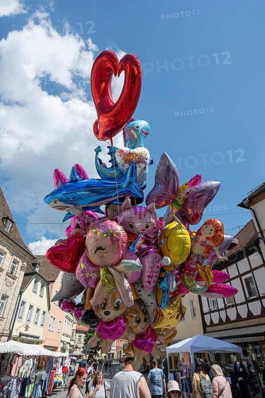 Colourful balloons for sale at a town festival in Forchheim, Upper Franconia, Bavaria, Germany