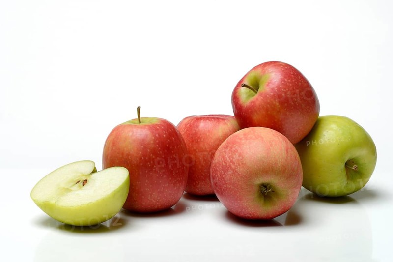 Several apples, varieties 'Pink Lady' and 'Greenstar'