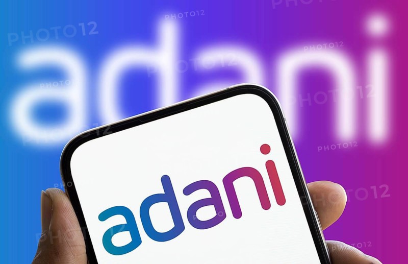 Dhaka, Bangladesh- 0 Dec 2024: Adani logo is displayed on smartphone. Adani Group is an Indian multinational company