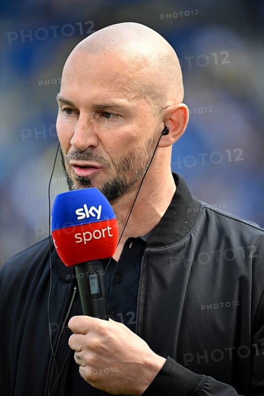 Coach coach Christian Ilzer TSG 1899 Hoffenheim portrait in interview microphone micro logo SKY soccer Bundesliga, PreZero Arena, Sinsheim, Baden-Württemberg, Germany