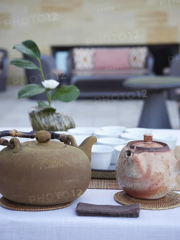 Terracotta teapots on the table for traditional tea service