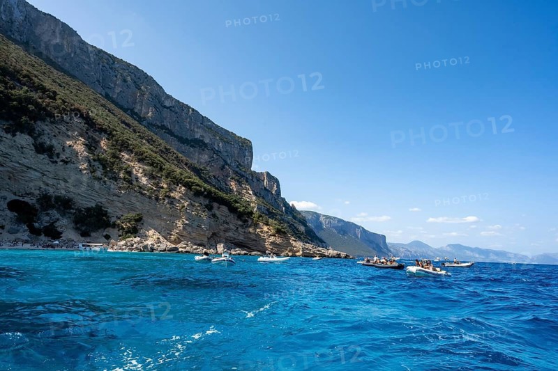Picturesque rocky coast, cliffs and blue sea, Golfo di Orosei, Baunei, Sardinia, Italy