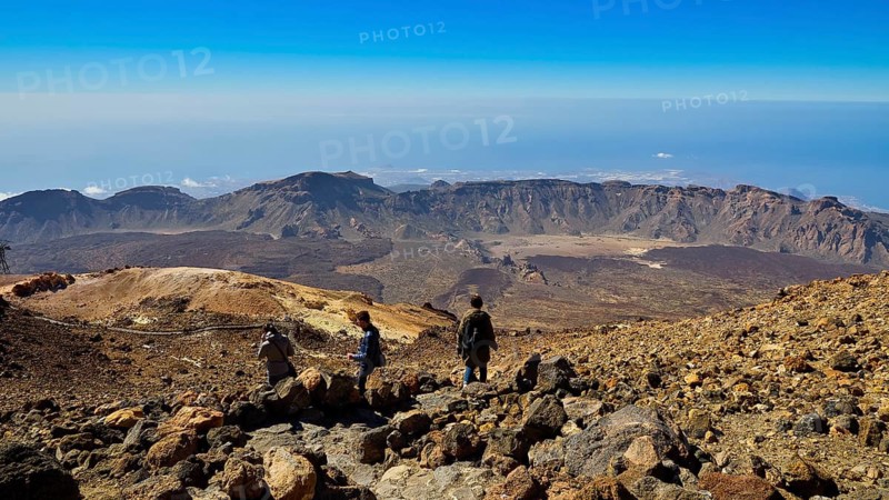 Pico del Teide, summit of Mount Teide, Three people enjoying spectacular views of the mountains, Teide National Park, Teide National Park, volcano, volcanism, UNESCO World Heritage Site, Tenerife, Canary Islands, Spain