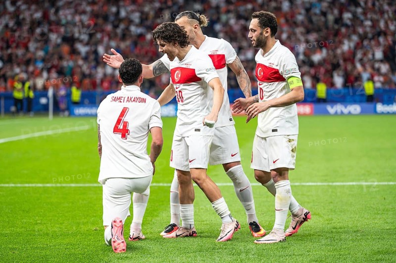 BERLIN, GERMANY - JULY 6, 2024: Euro 2024 quarterfinal match Nederlands vs Turkey (Turkiye) 2:1. Samet Akaydin (L) Ferdi Kadioglu (R) joy after scoring goal.