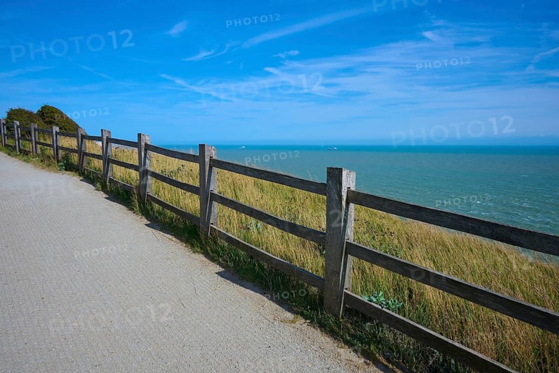 Wooden fence along a coastal path with views of the sea and sky, summer, English Channel, Dover, Kent, England, Great Britain