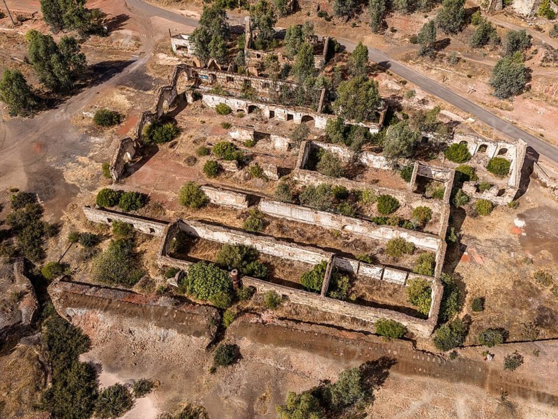 Ruins of former workshop halls, Mina de Sao Domingos, historic copper open-pit mine, aerial view, Portugal