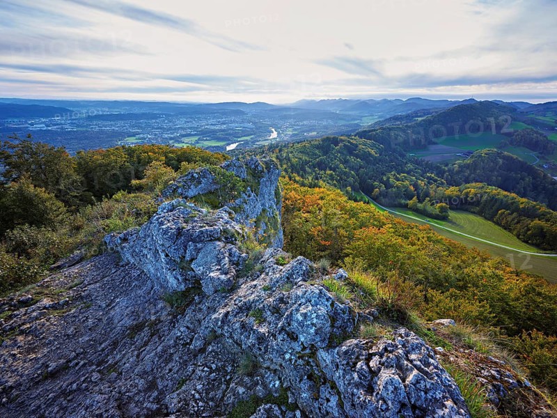 View from the Gisliflue of an autumnal forest with the Jura foothills behind, Talheim, Canton, Aargau, Switzerland