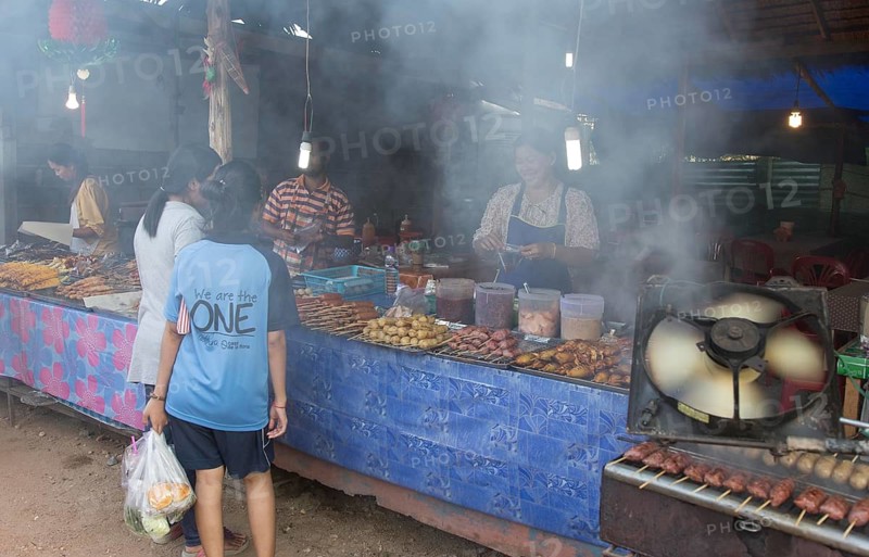 Khao Lak, Thailand, 03.02.2014 JE - A Thai woman prepares Thai specialties at a market in Khao Lak, Khao Lak, Thailand