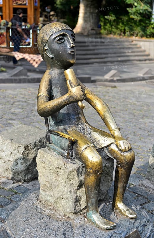 Bronze replica of an antique statue of a traditional table master, or tamada, with wine horn, Tblisi, Georgia