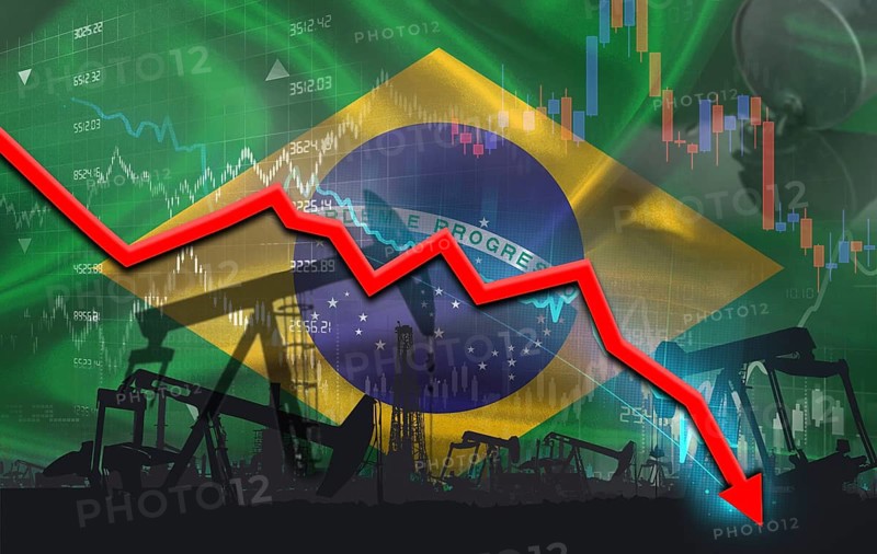 Crude crisis with Brazilian flag on financial graph. Fall oil price with flag of Brazil on economic chart