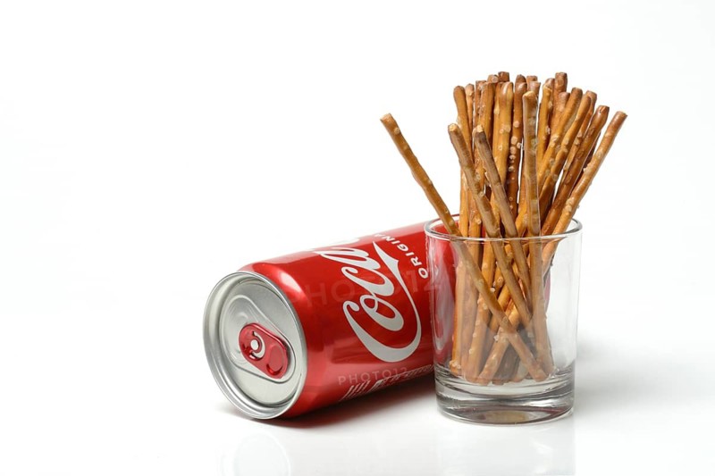 Pretzel sticks and cola