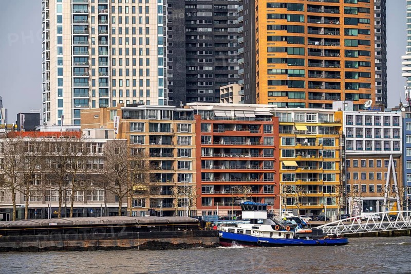 Shipping traffic on the Nieuwe Maas, city center skyline, cargo ships, Rotterdam, Netherlands