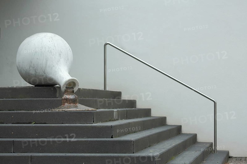 Fallen jug with leaking liquid on steps, outdoor staircase, modern art, sculpture, vase, amphora, flowing out, leaking, emptying, symbol, fallen over, railing, city museum, Hofheim am Main, Taunus, Hesse, Germany