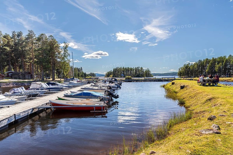 Small harbor with pleasure boats on the shores of Lake Siljan near Tällberg, Dalarnas län, Sweden