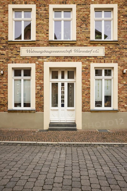 Historic brick building of Wohnungsbaugenossenschaft Warendorf e.G. in Warendorf, district of Warendorf, North Rhine-Westphalia, Germany