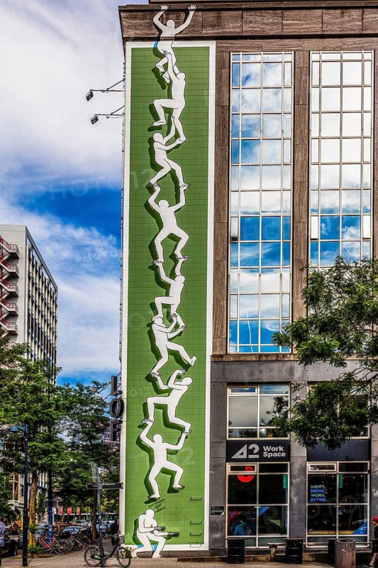 Artwork from the Rotterdam Make It Happen street art campaign in the city center, invites passers-by to become part of the work of art through built-in steps, Rotterdam, the Netherlands