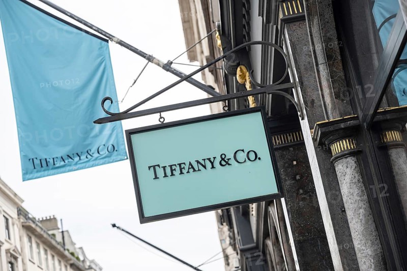 London, United Kingdom. April 9th 2026 Brand logo and sign for Tiffany and Co store front a jewellery and luxury gifts shop in New Bond Street, a luxury shopping district in central London, UK