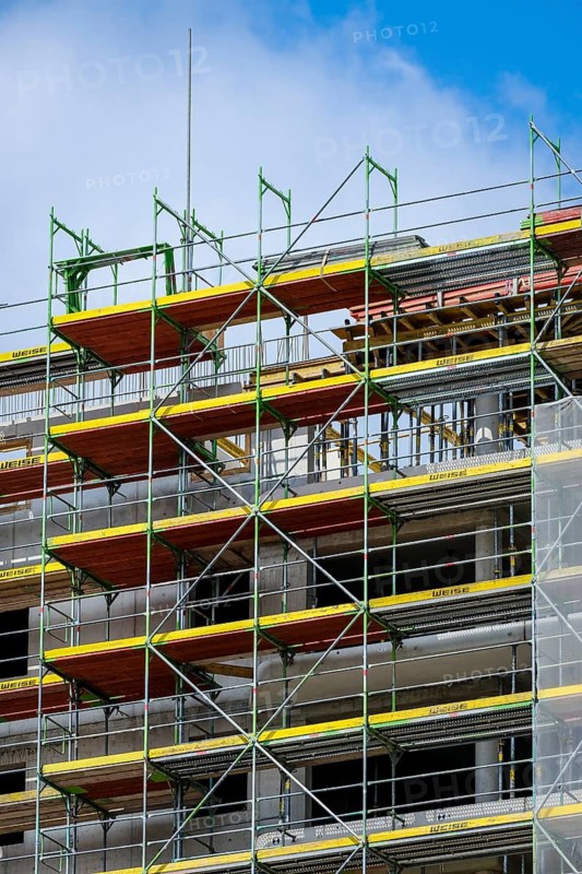 Essen, North Rhine-Westphalia, Germany - Scaffolding on the new building site of a high-rise block of flats