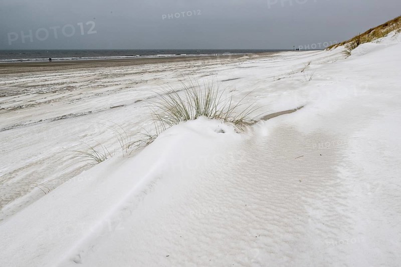 Snow-covered dunes on the North Sea beach, Langeoog, Lower Saxony, Germany